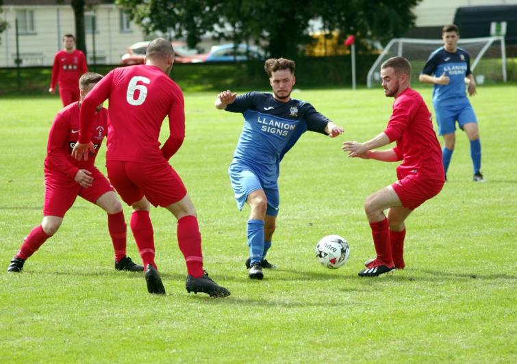Action from Bush Camp where champions Monkton Swifts proved too strong for derby rivals Pennar Robins